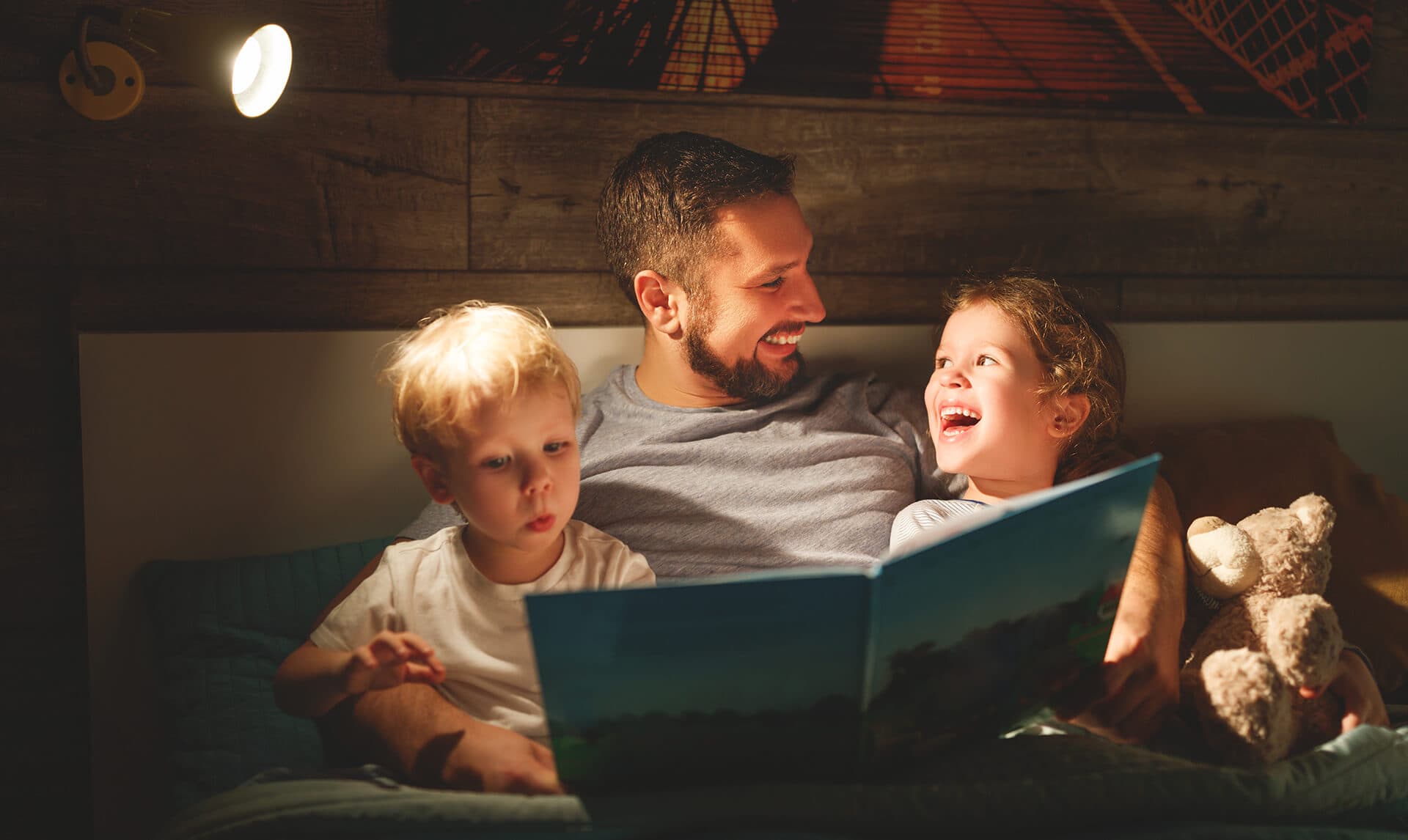 A family reading a bedtime picture book together